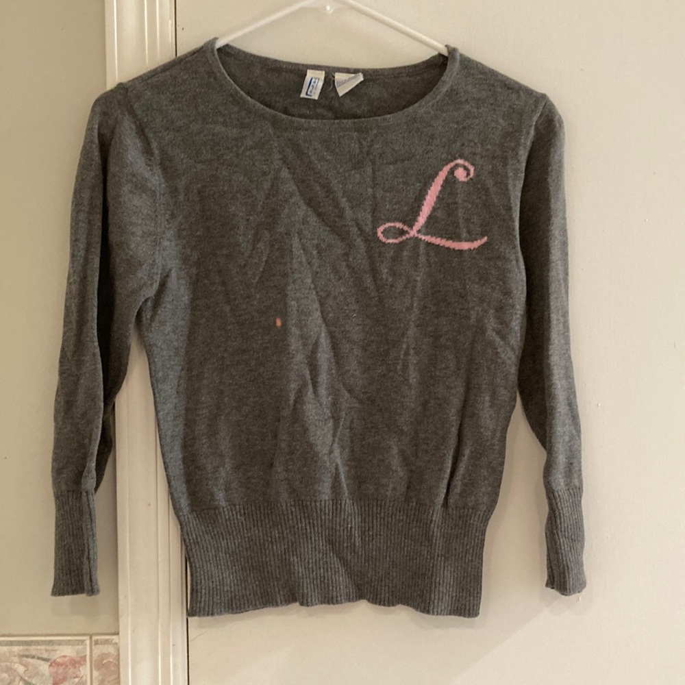 Juniors monogrammed “L” sweater